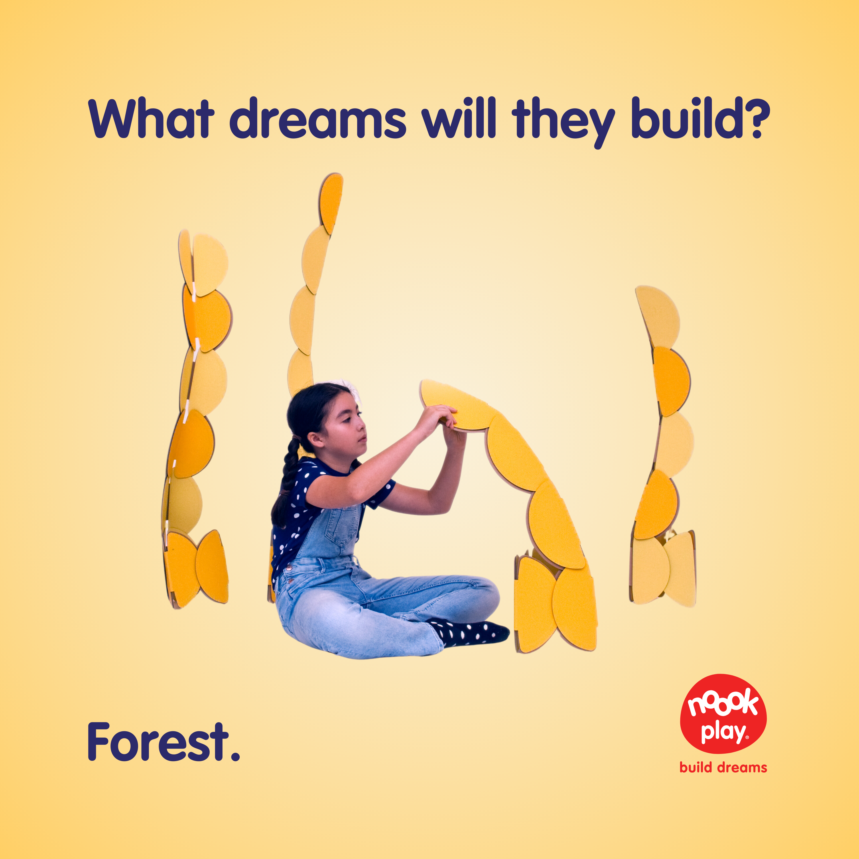 What dreams will you build with noook play®? This little girl is making a forest our of her noook play® set in yellow!