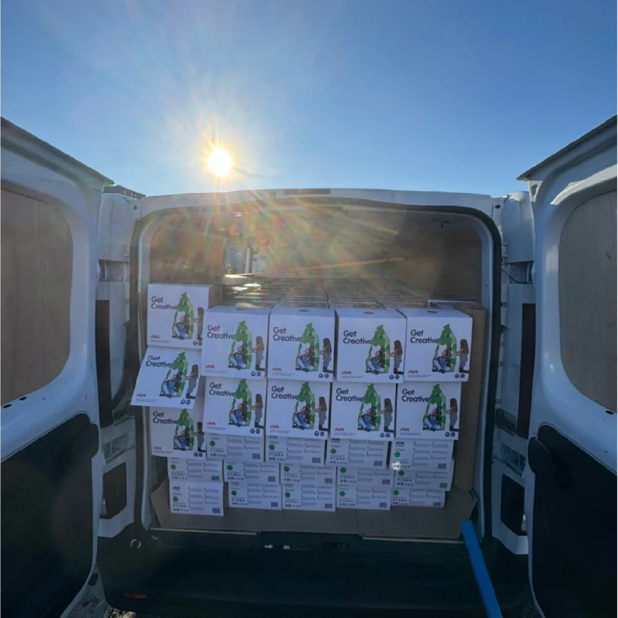 A delivery van full of noook play® packs.