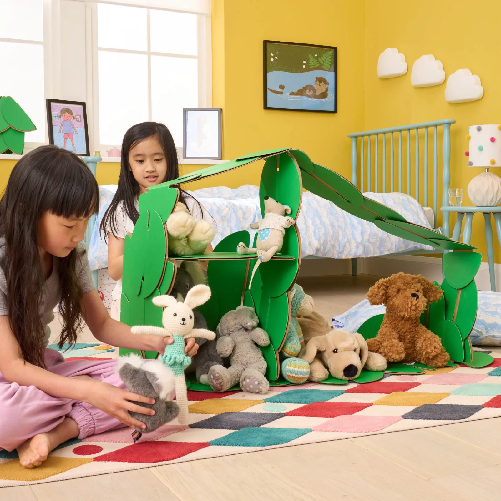 Children build a Dolls House with 36 noook play® discs, exploring creativity and storytelling through play