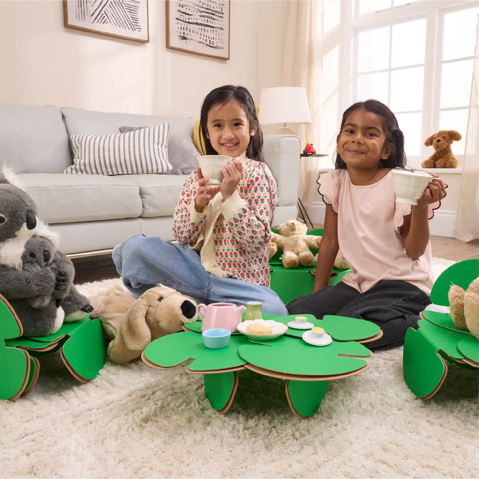 Two little girls are hosting a tea party with their favourite teddies in their sitting room. The tea party is made out of a noook play® building kit.
This Tea Party took 31 noook play® discs to build.