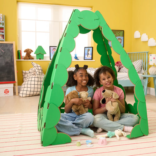 Children build a Tea House with 60 noook play® discs, creating a calm, imaginative space for play