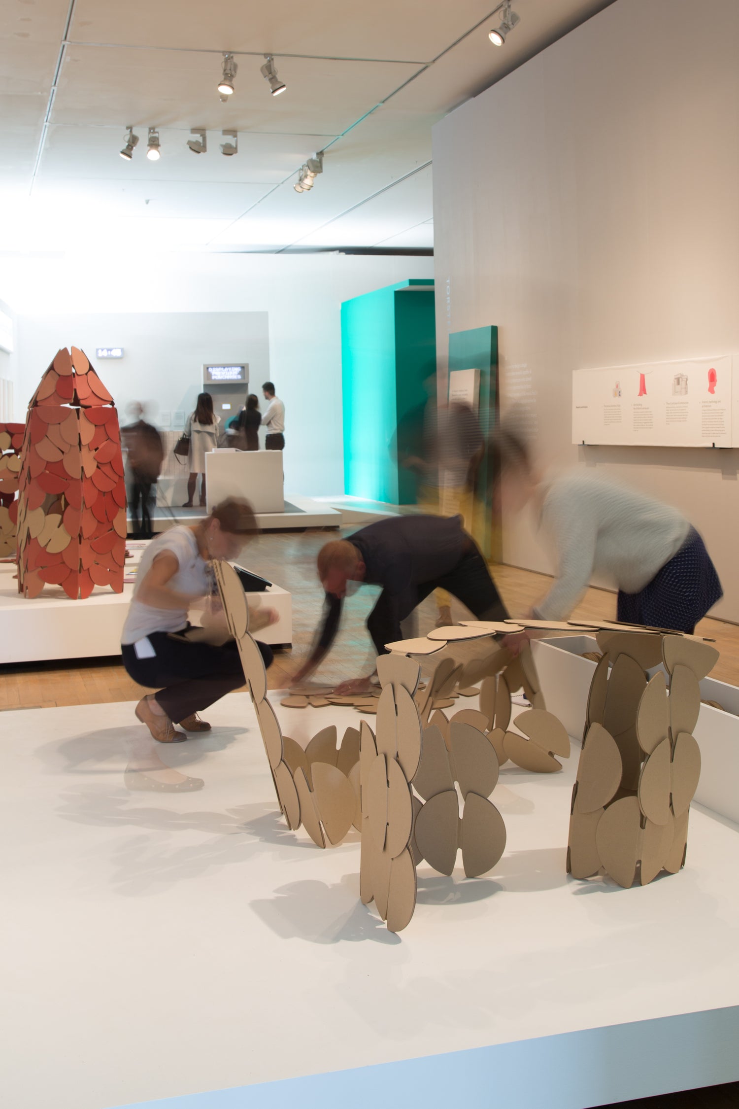 A scene at the Design Museum, London - people playing with prototype noook play construction toys.